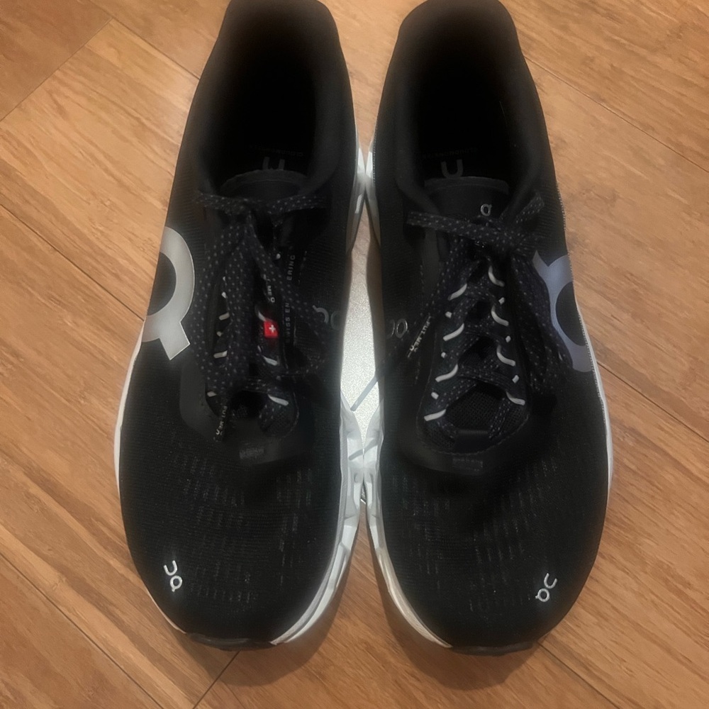 On Running Black and White Athletic Shoes